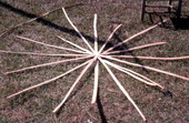 Wagon wheel shape of white oak strips layed out by Lucreaty Clark