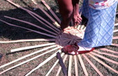 Lucreaty Clark starting to weave a white oak basket