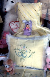 Cuban American baby doll on soft pillows in Little Havana - Miami, Florida.