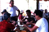 Cuban American men having a friendly game of dominoes in Little Havana - Miami, Florida.