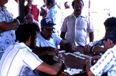Cuban American men playing dominoes in Little Havana - Miami, Florida.