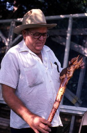John Albert holding a wood carving he made- Tampa, Florida