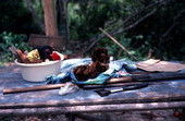 Palmetto fibers, collected by Mary Billie for dollmaking, drying in the sun - Big Cypress Reservation, Florida