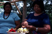 Mary Billie sewing clothes on the Seminole dolls she is making - Big Cypress Reservation, Florida