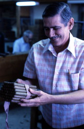 Ramar Cigars owner Rafael Martinez carrying 50 cigars - Miami, Florida.