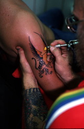 Tattoo artist Jon Fort at work - Pensacola, Florida.