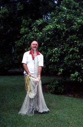 Lloyd Snow showing how to use a cast net - Daytona Beach, Florida