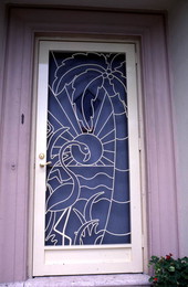 Don Latimer's decorative iron work on screen door - Miami, Florida.