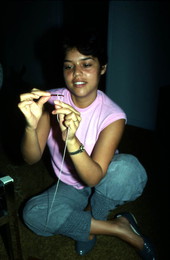 Mingly Caminero-Beheit making a hammock - Miami, Florida.