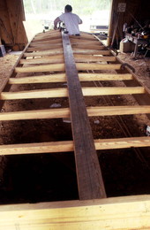 Bobby Shiver building the hull of an oyster skiff - Eastpoint, Florida