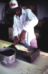 Clay Vioria cleaning fish at Toranto's Fish House - Apalachicola, Florida.