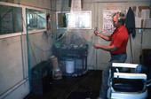 L. Scarabin making a cast net - Apalachicola, Florida