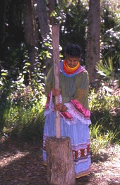Lottie Shore grinding corn - Brighton Reservation, Florida