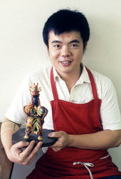 Fu-Yung Chang showing his rice dough sculpture- Jacksonville, Florida