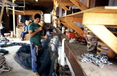 Rickey Doublerly knitting a fishing net - Jacksonville, Florida