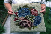 Marjorie Cornelius holding a rug she "hooked" - Apopka, Florida