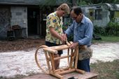 Apprentice Neil Brooks being mentored by furniture maker Robert Rudd in the art of making cypress furniture - Lake Worth, Florida.