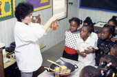 Erma Celzo giving a Philippino cooking demonstration of Pancit at John E. Ford Elementary School - Jacksonville, Florida.