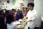 Erma Celzo giving a Philippino cooking demonstration of Pancit at John E. Ford Elementary School - Jacksonville, Florida.
