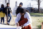 Prema Kumar giving a rice flour painting demonstration to kindergarten students - Jacksonville, Florida.