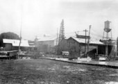 General view of plant with settling vats in foreground