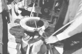 Plastic hose clamped to bailer line of the acidizing well