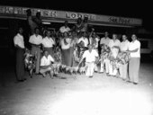 Group of men holding up their fish catch