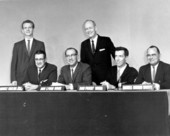 Governor Farris Bryant standing by members of the press