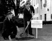 Governor LeRoy Collins planting pine seedling with State Forester C.H. Coulter