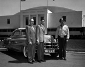 Tom Moore with friends by cadillac at the Florida Citrus Building - Winter Haven, Florida