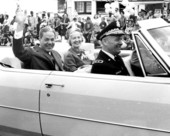 Governor and Mrs. Haydon Burns with Adjutant General Henry W. McMillan riding to inaugural parade reviewing stand - Tallahassee, Florida.