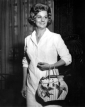 Mrs. Doyle Conner modeling clothing at a fashion show she gave at the Tallahassee Country Club for Mrs. Kirk - Tallahassee, Florida.
