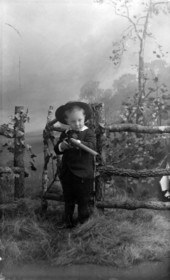 Francis Winthrop with toy gun.