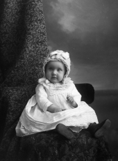 Cohen? baby wearing a bonnet.