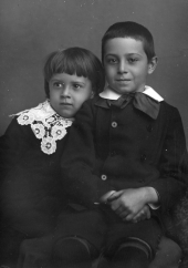 Sister leaning on her brother.