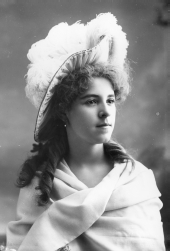 Elise Peeler wearing a large feather hat.
