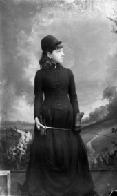 Girl in a riding habit.