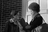 Kathleen Cleaver, right, talking with an unidentified woman in front of Reverend C.K. Steele's church during her visit to Tallahassee, Florida.