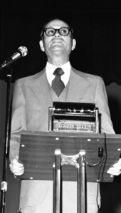 Unidentified man delivering a civil rights speech in an auditorium.