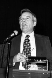 Unidentified man delivering a civil rights speech in an auditorium.