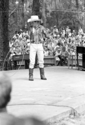 View of trick roper Danny Coflin performing at the 1970 Florida Folk Festival - White Springs, Florida.