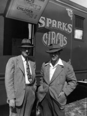 Circus presidents standing next to a Sparks Circus train in Sarasota, Florida.