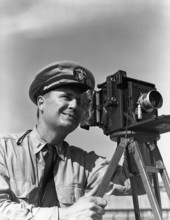 Lt. Joe J. Steinmetz with Speed Graphic camera at NAS Pensacola.