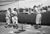 View showing batter receiving instruction during the Brooklyn Dodgers training camp in Vero Beach, Florida.