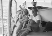 Photographer's daughter Lois Duncan Steinmetz and first mate Victor Ambo aboard the charter boat "Tramp" in the Dry Tortugas.