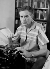 Portrait of author Philip Wylie at his typewriter.