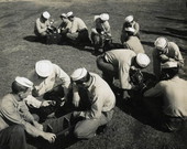 Naval Photography School instructors showing 4x5 cameras to students at NAS Pensacola.