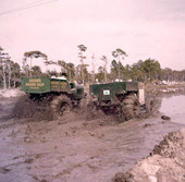 Buggies racing in the inaugural Swamp Buggy Jubilee at the fairgrounds in Sarasota, Florida.