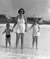 Lois Foley Steinmetz and her children entering the Gulf of Mexico surf.