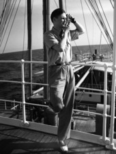 Photographer Joe Steinmetz taking photos on board a ship traveling to Guatemala.